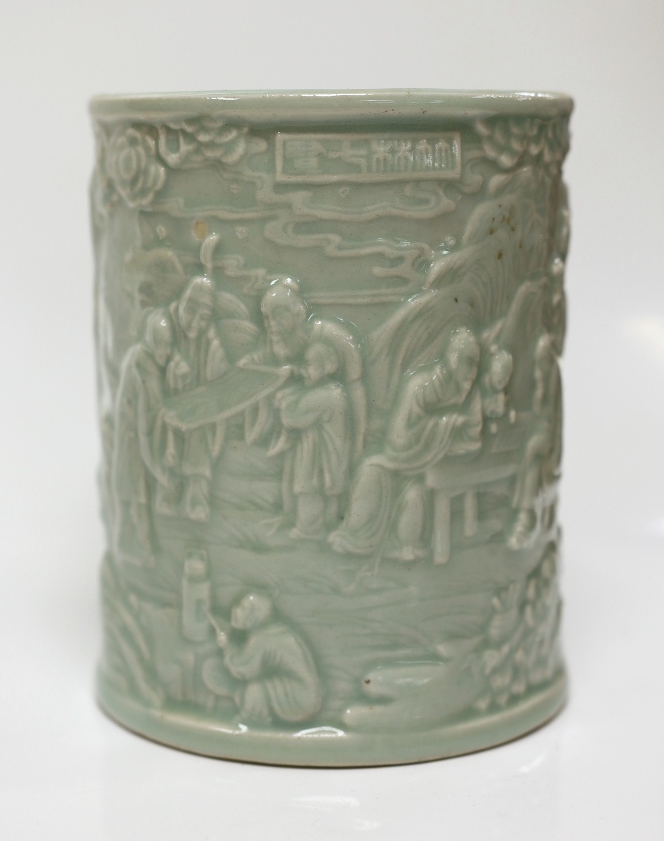 A Chinese celadon glazed brush pot, 15cm